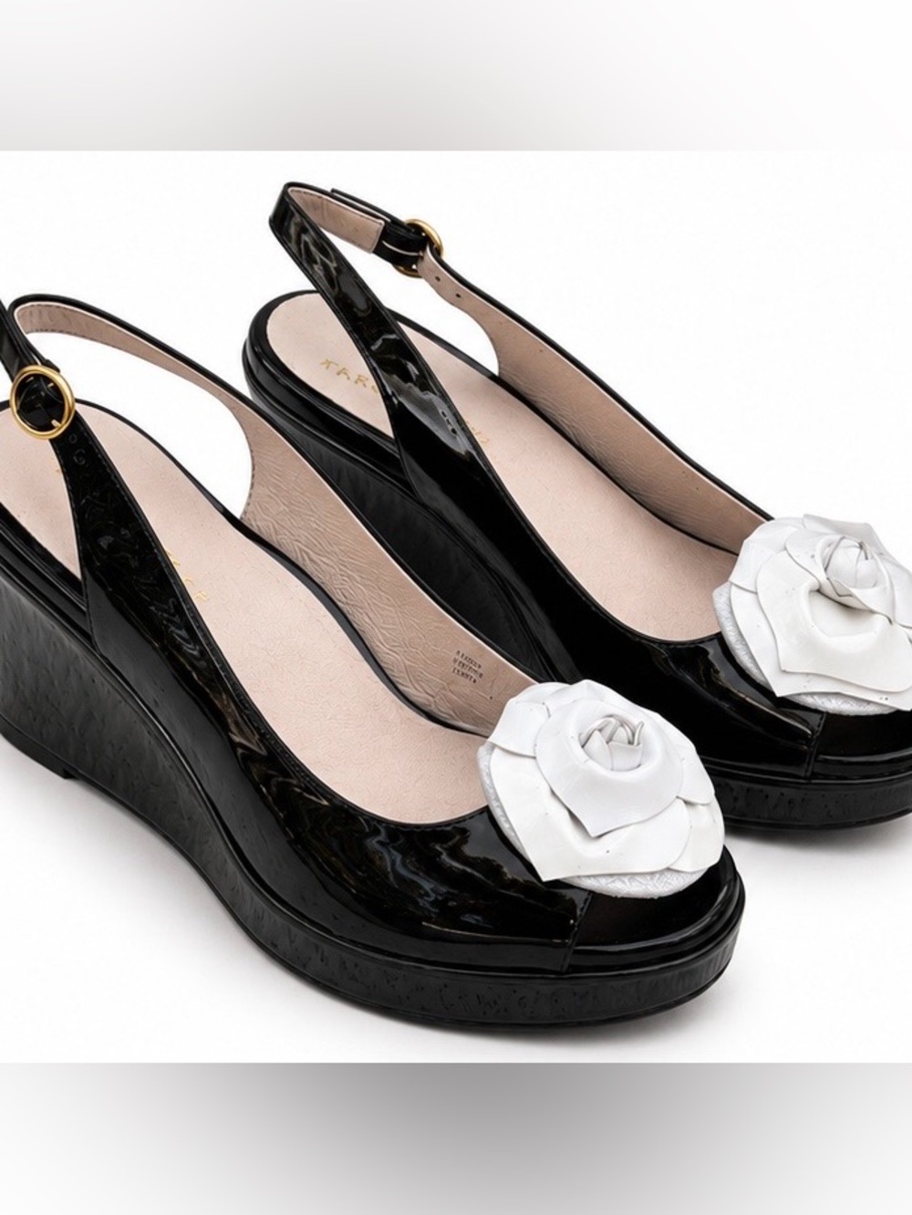 Size 9 Taryn Rose Black Patent Slingback Wedge with White Flower.like new.